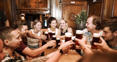 Guests enjoy a beer on tour.